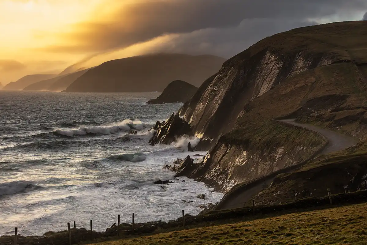 The road to Coumeenoole Strand and The Cliffs at Dunmore Head with the Blasket Islands Dingle Co. Kerry Ireland