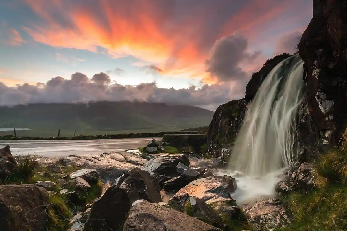 The waterfall beside the lay-by on the Conor Pass Road, Dingle, Kerry, Ireland captured at sunset.